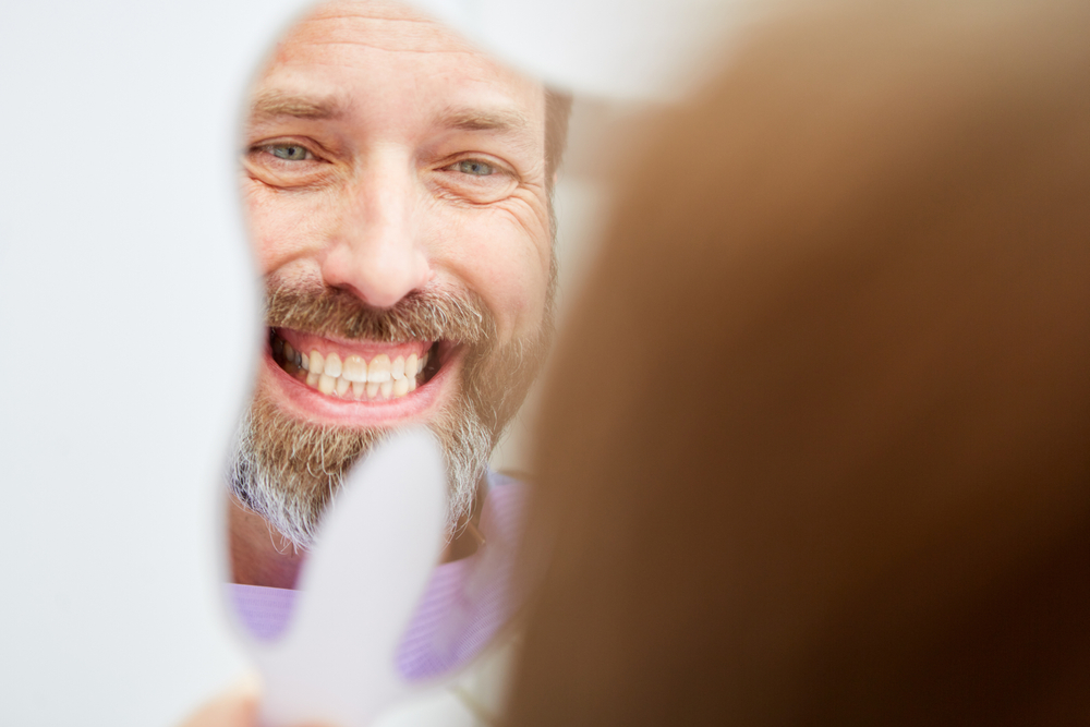 Man,At,The,Dentist,Is,Happy,About,His,Tooth,Color