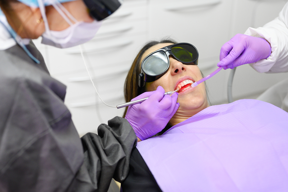 Dentist,Using,A,Modern,Diode,Dental,Laser.,High,Quality,Photo