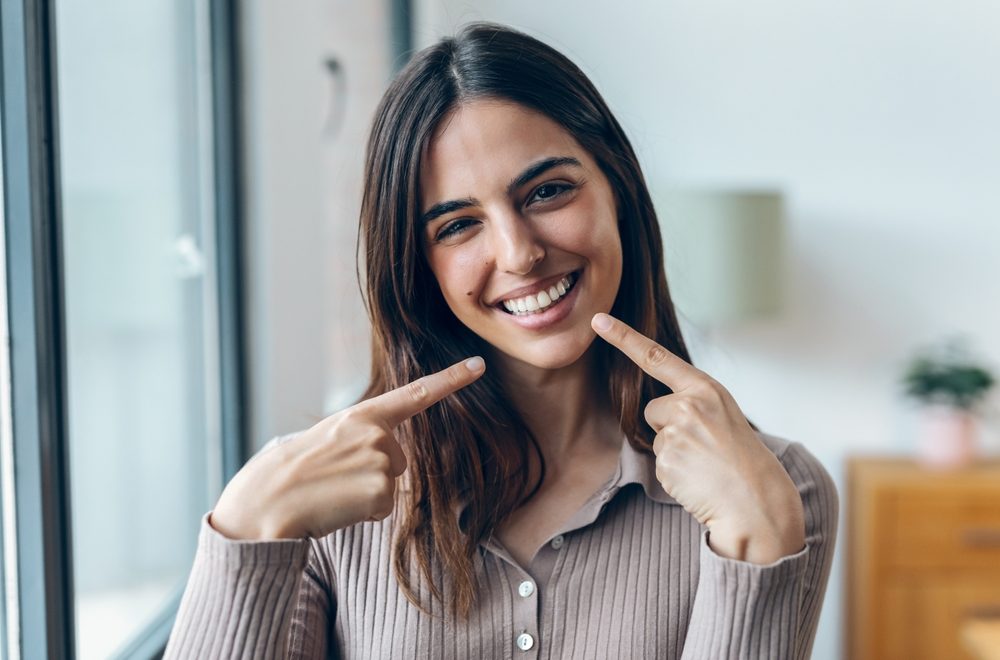 Portrait,Of,Beautiful,Young,Woman,With,Perfect,Smile,In,The