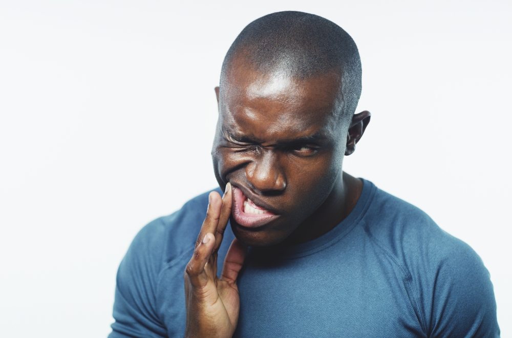 Toothache,,Pain,And,Black,Man,On,A,White,Background,For
