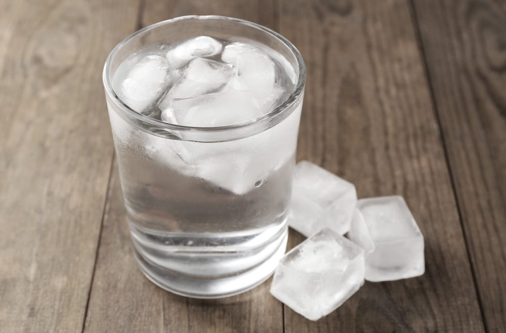 Summer,Cocktail,With,Ice,Cubes,On,Wooden,Table