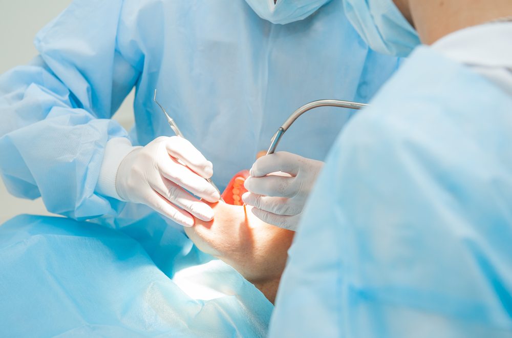 Close,Up,Dental,Surgery,Process,-,Implantation.,Dentist,Surgeon,With